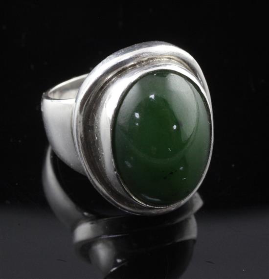A George Jensen sterling silver and nephrite ring, no. 46A, size M.